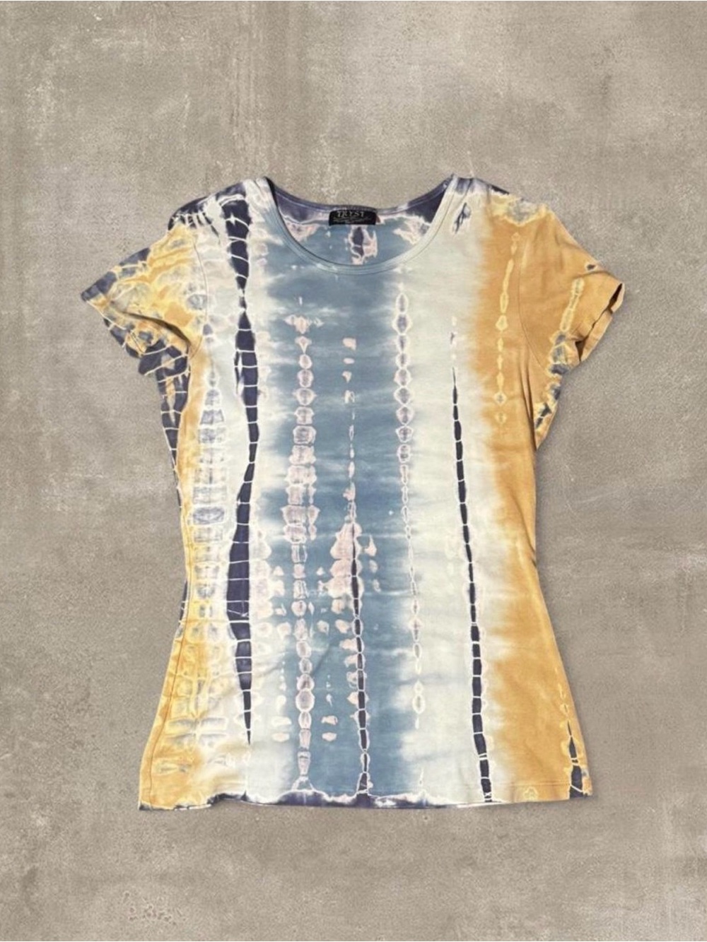 Blue, white, and beige tie-dye baby tee